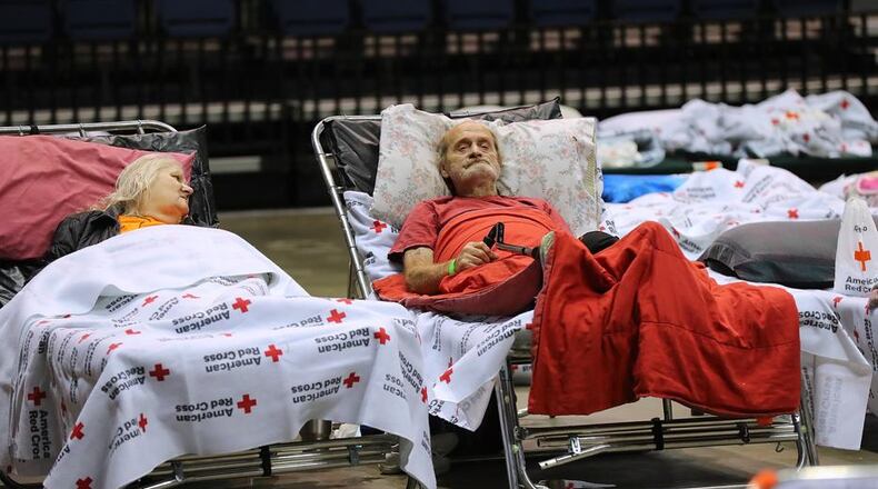 Local residents Thomas Lairsey, 71, and his wife Ann, 67, move into the Red Cross shelter at the Albany Civic Center to ride out Hurricane Irma on Sunday, Sept. 10. (AJC Photo / Curtis Compton)
