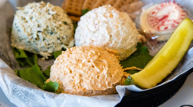 A three-scoop combo at Chicken Salad Chick, including (from front to rear) Buffalo Barclay, Sassy Scotty and Lauryn’s Lemon Basil. CONTRIBUTED BY HENRI HOLLIS