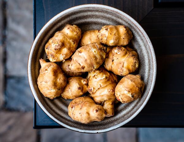 Sunchokes have an earthy, sweet and nutty flavor profile and potato-like texture. They can be fried, boiled, steamed, grilled, mashed or pureed as a base for soups. CONTRIBUTED BY HENRI HOLLIS