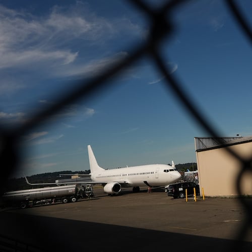 FILE - A U.S. Immigration and Customs Enforcement flight operates out of King County International Airport-Boeing Field, Aug. 23, 2025, in Seattle. (AP Photo/Lindsey Wasson, File)