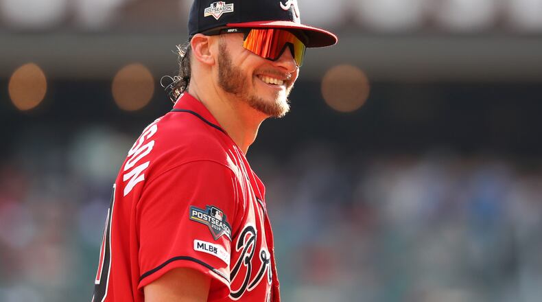 Braves third baseman Josh Donaldson jokes with the St. Louis Cardinals dugout after a play in the second inning. (JASON GETZ/SPECIAL TO THE AJC)