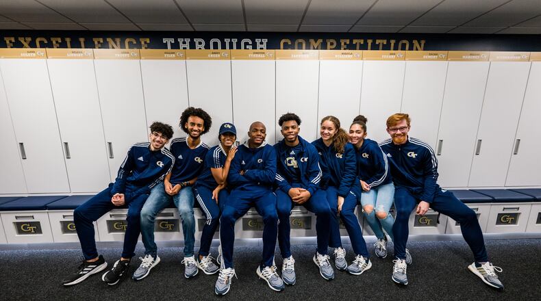 Members of Georgia Tech's track and field and cross country teams gather for a photo during the Jan. 18, 2022 unveiling of the Michael K. Anderson Building that will house locker rooms and other spaces dedicated to the teams. (Danny Karnik/Georgia Tech Athletics)