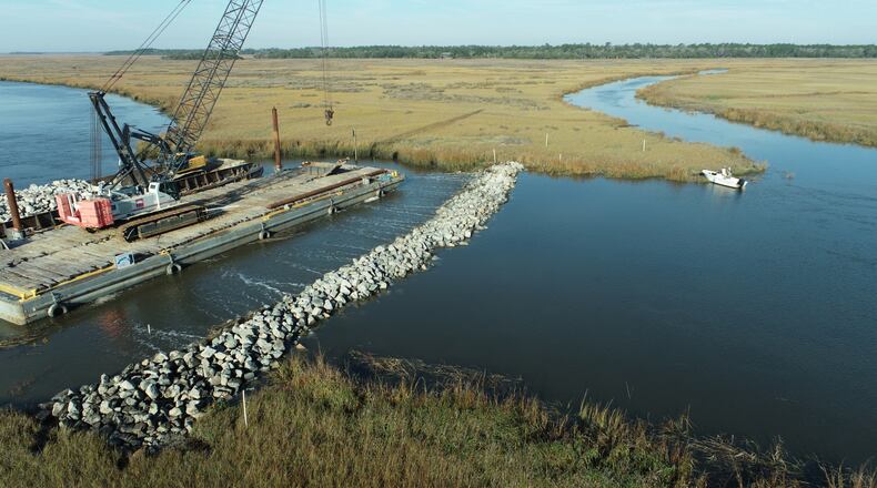 FILE: The Army Corps of Engineers has blocked off man-made cuts through Georgia's coastal salt marsh, restoring the natural flow of water.