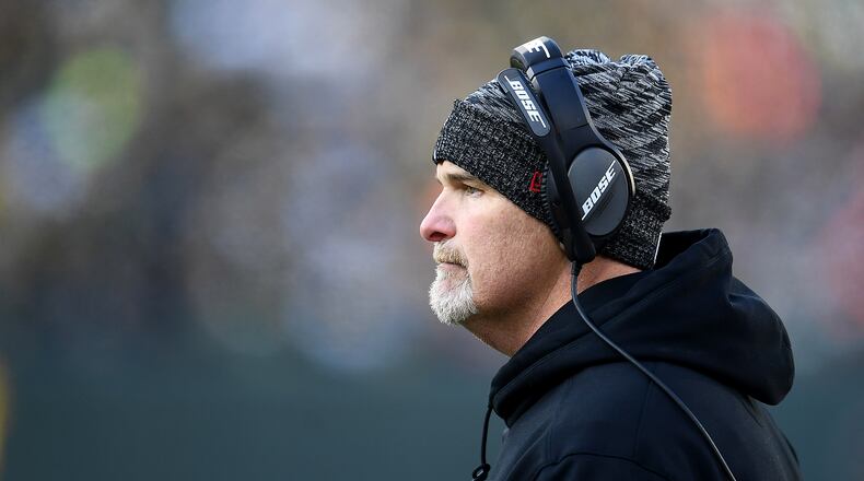 GREEN BAY, WISCONSIN - DECEMBER 09: Head coach Dan Quinn of the Atlanta Falcons watches from the sideline during the second half of a game against the Green Bay Packers at Lambeau Field on December 09, 2018 in Green Bay, Wisconsin. (Photo by Stacy Revere/Getty Images)