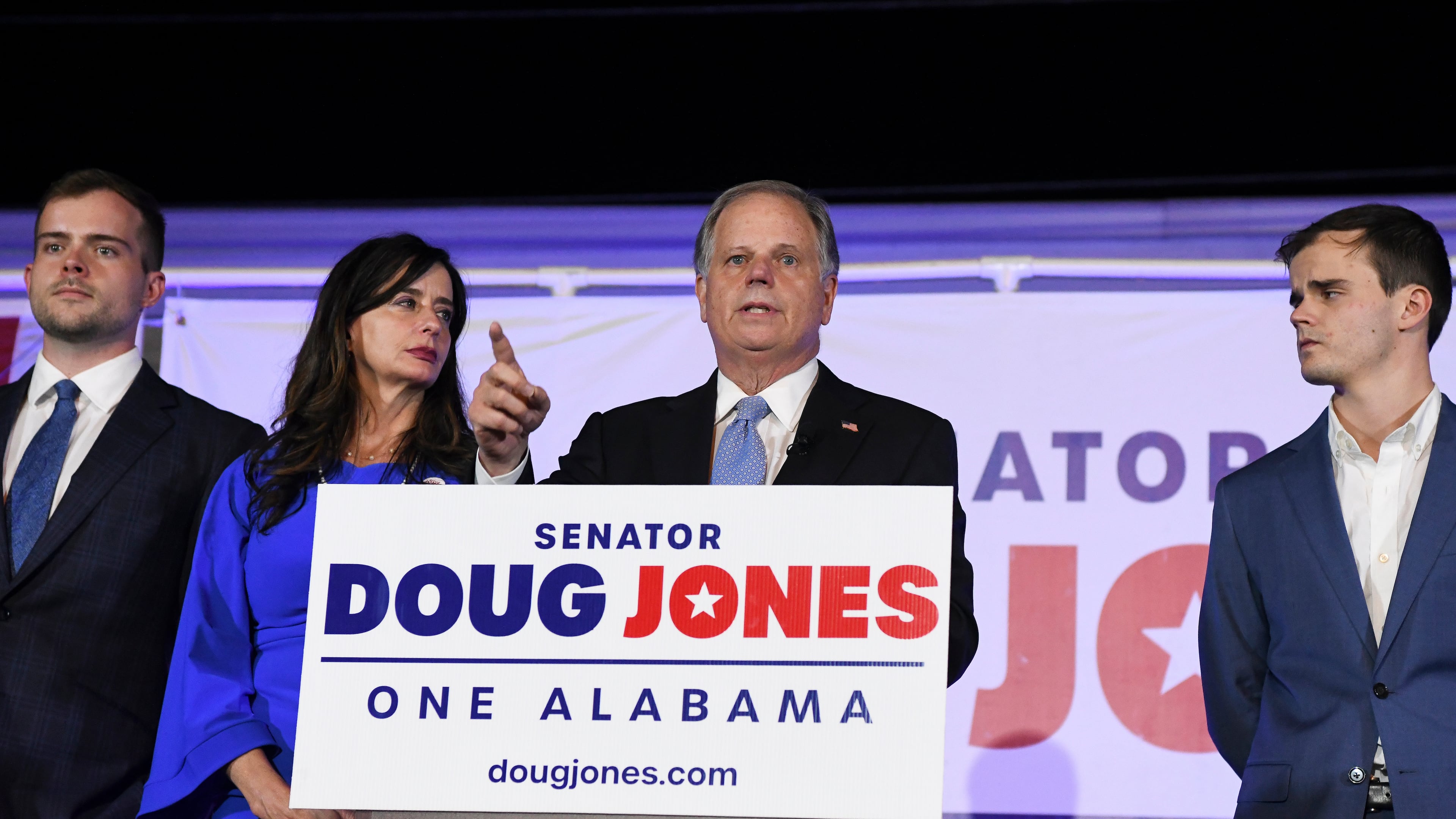 FILE - Sen. Doug Jones delivers his concession speech surrounded by family during his election night watch party, Nov. 3, 2020, in Birmingham, Ala. (AP Photo/Julie Bennett, File)