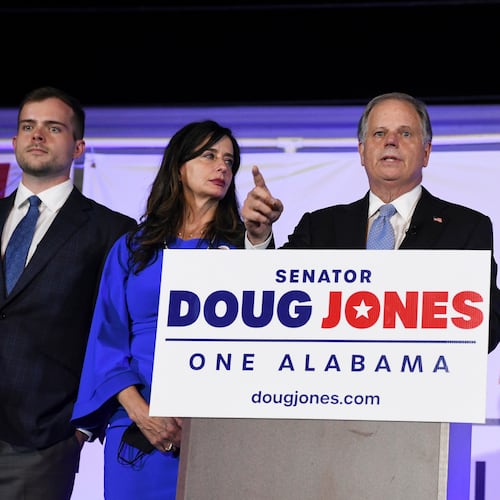 FILE - Sen. Doug Jones delivers his concession speech surrounded by family during his election night watch party, Nov. 3, 2020, in Birmingham, Ala. (AP Photo/Julie Bennett, File)