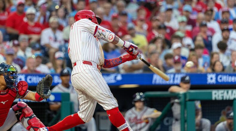 Philadelphia Phillies designated hitter Kyle Schwarber hits a solo home run during the fourth inning of a baseball game against the Atlanta Braves, Saturday, Sept. 5, 2026, in Philadelphia. (AP Photo/Laurence Kesterson)