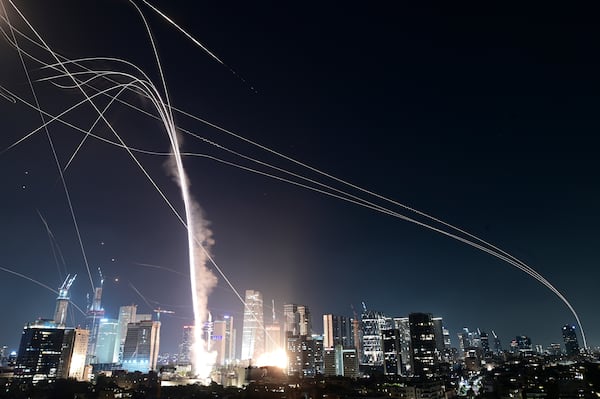 Israeli Iron Dome air defense system fires to intercept missiles over Tel Aviv, Israel, Friday, June 13, 2025. (AP Photo/Tomer Neuberg)