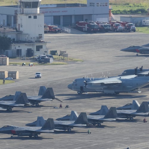 U.S. military aircraft are parked on the tarmac at Jose Aponte de la Torre Airport in Ceiba, Puerto Rico, Saturday, Jan. 3, 2025. (AP Photo/Alejandro Granadillo)