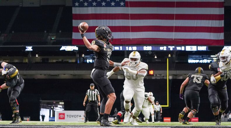 East quarterback Evan Prater (3) throws a pass facing a rush by West defensive lineman Jacobian Guillory (90) during the 2020 All-American Bowl Jan. 4, 2020 at the Alamodome in San Antonio, Texas.