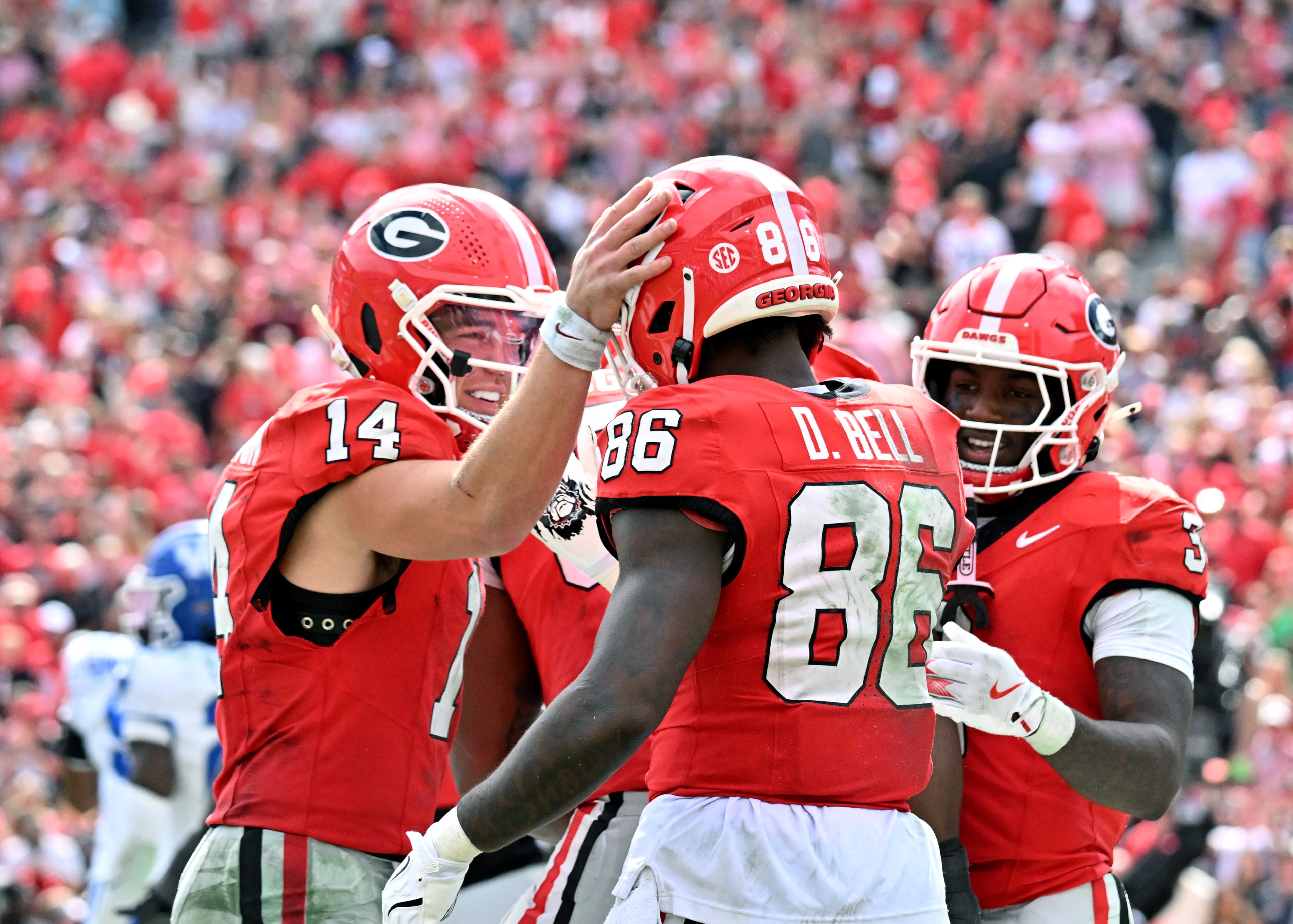 Georgia wide receiver Dillon Bell (86) celebrates with Georgia quarterback Gunner Stockton (14) after scoring a touchdown during the second half in a NCAA college football game at Sanford Stadium, Saturday, October 4, 2025, in Athens. Georgia won 35 -14 over Kentucky. (Hyosub Shin / AJC)