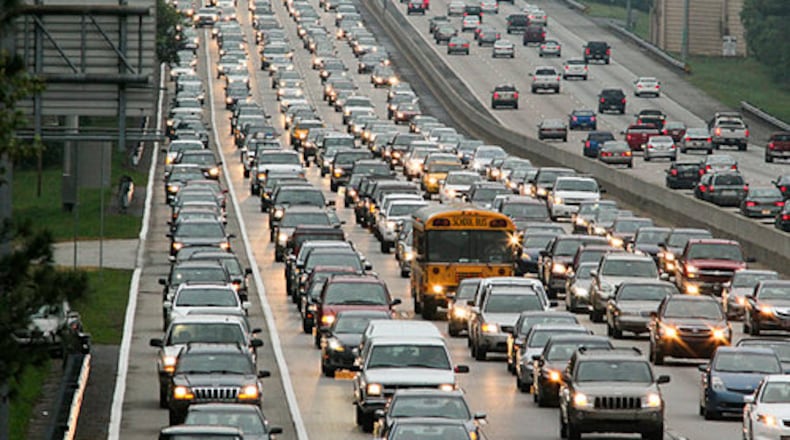 The Ga. 400 southbound shoulder lane opened to morning rush hour traffic Monday in an effort to relieve congestion on one of Georgia's busiest roads. The new setup didn't appear to be helping much, as bumper-to-bumper traffic was reported between Windward Parkway and Northridge Road.