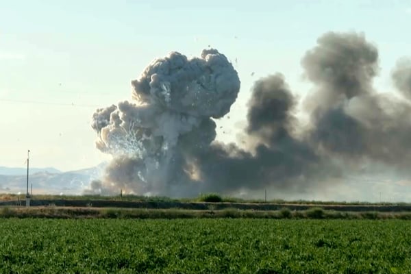 In this image taken from video, smoke and flames rise from a fireworks warehouse explosion, July 1, 2025, in Esparto, Calif. (Hudson Sheats via AP)