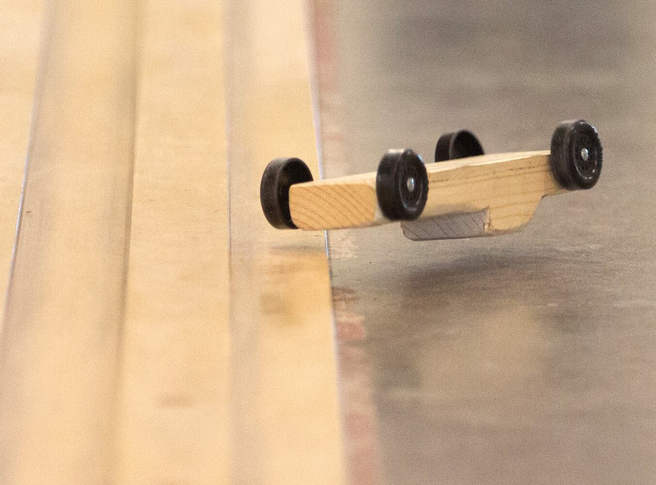 Cub Scouts building pinewood derby cars