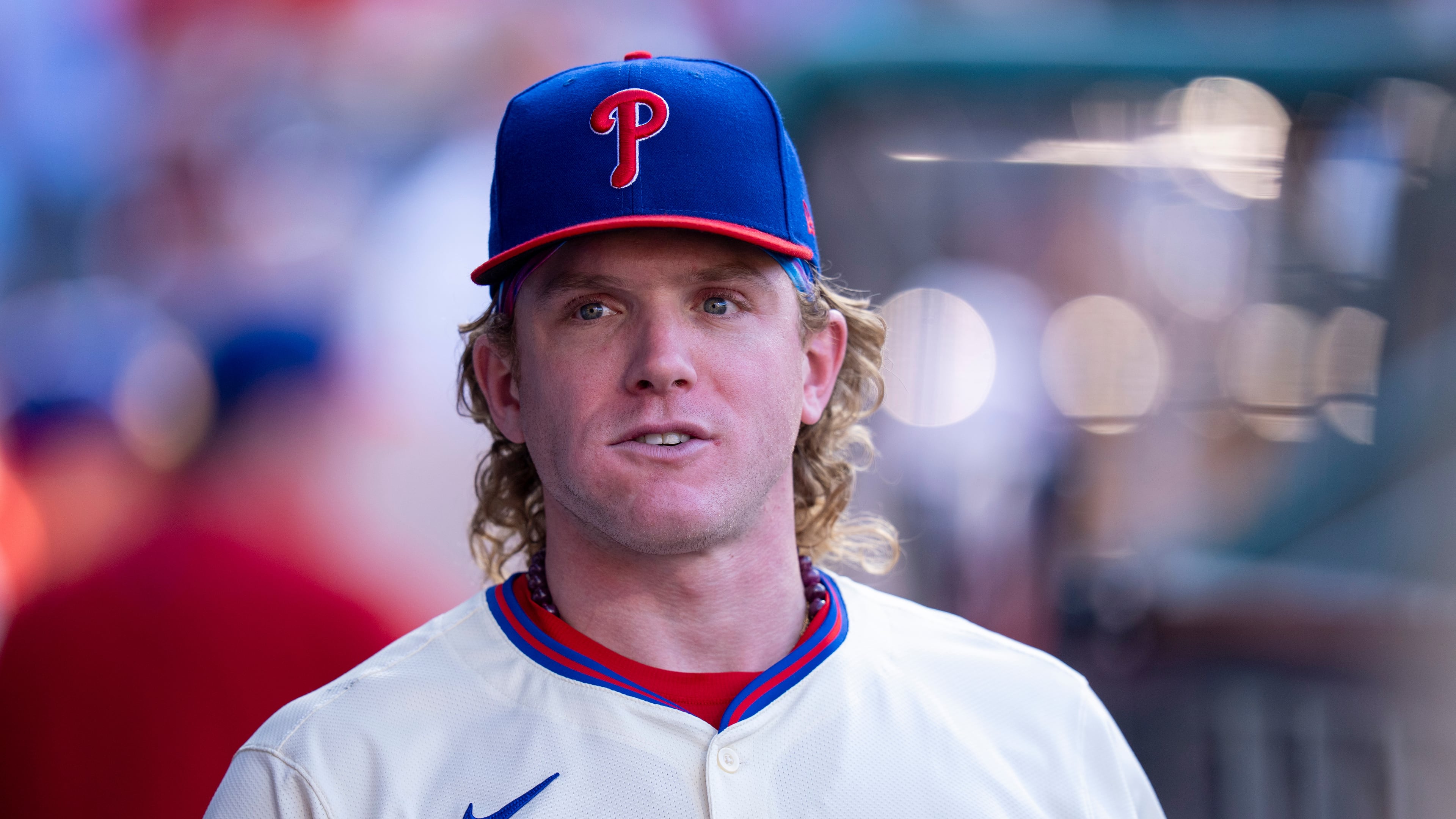 Philadelphia Phillies' Harrison Bader looks on from the dugout during the sixth inning of a baseball game against the Minnesota Twins, Sunday, Sept. 28, 2025, in Philadelphia. (AP Photo/Chris Szagola)