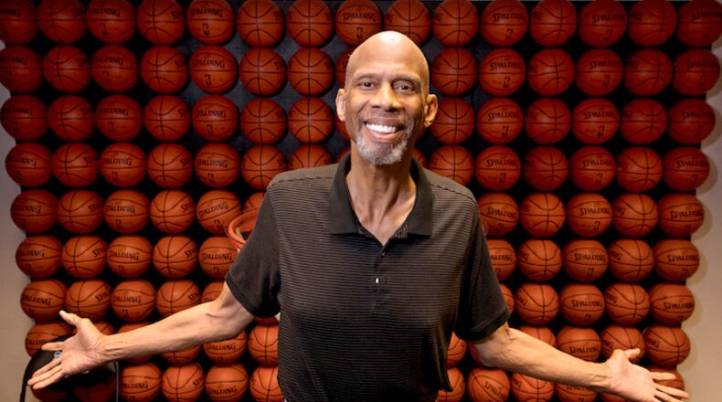 In this Monday, Feb. 12, 2018 photo, Kareem Abdul-Jabbar poses in his office, in Newport Beach, Calif. Abdul-Jabbar has been a best-selling author, civil-rights activist, actor, historian and one of the greatest basketball players who ever lived. This fall Abdul-Jabbar will embark on a cross-country tour as part of âBecoming Kareem,â a stage show in which heâll discuss his life, answer audience questions and talk about the key mentors in his life he says helped him achieve his goals along the way. (AP Photo/Mark J. Terrill)