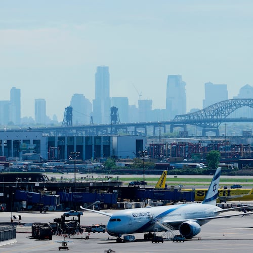 FILE - The New York City skyline is seen behind Newark Liberty International Airport in Newark, N.J., Wednesday, May 7, 2025. (AP Photo/Seth Wenig,File)