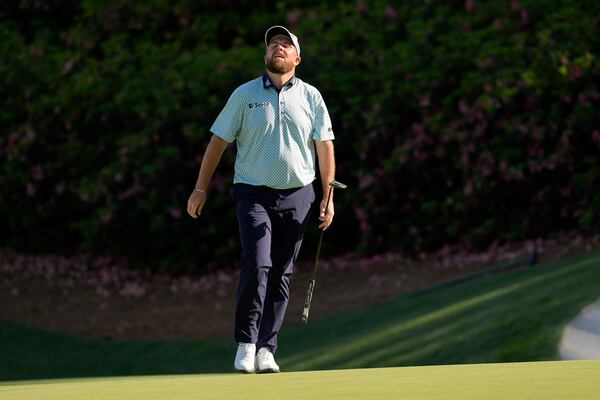 Shane Lowry, of Ireland, reacts after missing a putt on the 13th hole during the third round at the Masters golf tournament, Saturday, April 12, 2025, in Augusta, Ga. (AP Photo/David J. Phillip)