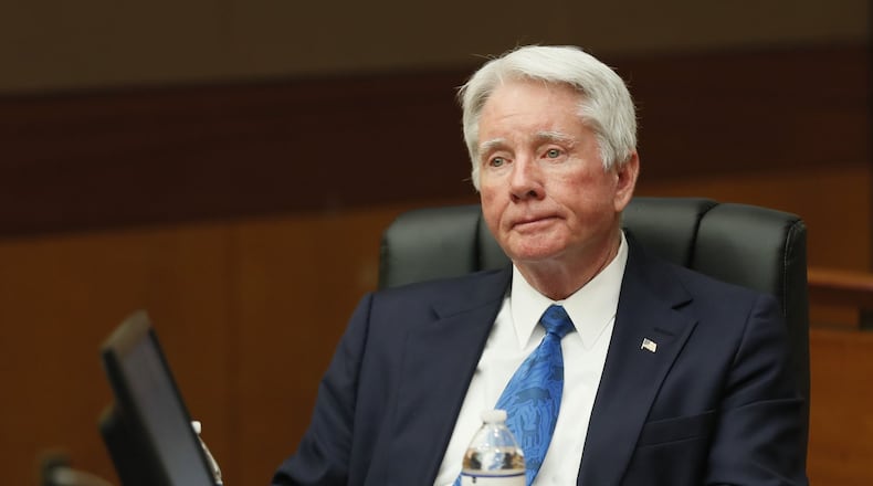 Tex McIver watches defense co-counsel Don Samuel during final arguments at McIver's murder trial in April 2018 at the Fulton County Courthouse. (Bob Andres / bandres@ajc.com)