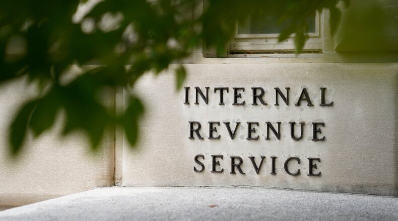 FILE - A sign is displayed outside the Internal Revenue Service building May 4, 2021, in Washington. (AP Photo/Patrick Semansky, File)