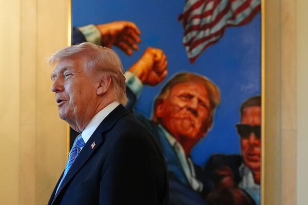 President Donald Trump speaks with small business owners in the Grand Foyer of the White House on Monday. (Jacquelyn Martin/AP)