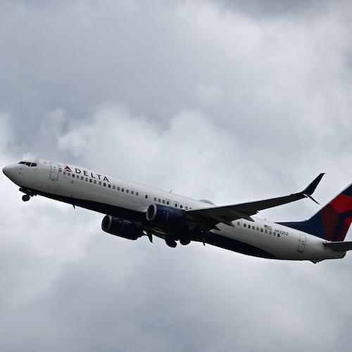 A Delta Air Lines plane is shown near Hartsfield-Jackson Atlanta International Airport on Thursday, May 28, 2026. Two planes carrying hundreds of passengers between them had a close call at the Atlanta airport this week. (Hyosub Shin/AJC)