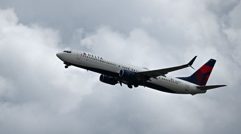 A Delta Air Lines plane is shown near Hartsfield-Jackson Atlanta International Airport on Thursday, May 28, 2026. Two planes carrying hundreds of passengers between them had a close call at the Atlanta airport this week. (Hyosub Shin/AJC)