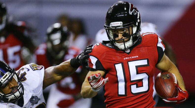 090315 ATLANTA: Falcons wide receiver Nick Williams picks up a long gain against Ravens Andrew Bose during the second half of their preseason game on Thursday, Sept. 3, 2015, in Atlanta. Curtis Compton / ccompton@ajc.com