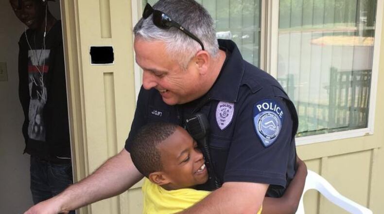 The Kent Police Department in Washington state shared the photo on its Facebook page, saying, 'Sometimes, this is our job and it ain’t too shabby.'