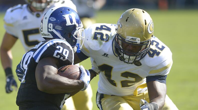 Georgia Tech junior DE KeShun Freeman (42) closes in on Duke junior RB Shaun Wilson (29) as he runs the ball in the second half of the football game at Bobby Dodd Stadium Saturday, October 29, 2016. SPECIAL/Daniel Varnado