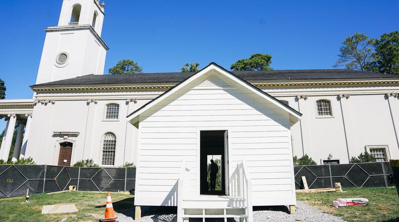 Artist, activist, and founder of The New Freedom Project, Charmaine Minniefield, shares the emotionally resonant narrative behind her second "Praise House," under construction at Emory University's campus. This initiative aims to foster reflection on the historical significance of worship spaces used by enslaved and newly freed people in the American South. Today marks her first visit to the space before it opens to the public in several weeks— Atlanta, Ga, Mon, Oct 2, 2023. (Photo by Olivia Bowdoin for the AJC).