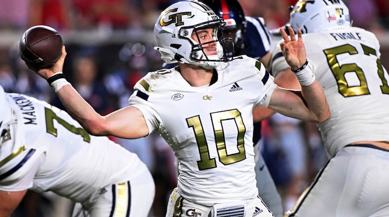 Georgia Tech quarterback Haynes King throws a pass against Mississippi during the second half an NCAA college football game in Oxford, Miss., Saturday, Sept. 16, 2023. (AP Photo/Thomas Graning)