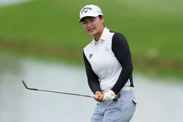 Yan Liu, of China, reacts to her shot on the nineth green during the third round of the Chevron Championship LPGA golf tournament Saturday, April 26, 2025, in The Woodlands, Texas. (AP Photo/Ashley Landis)