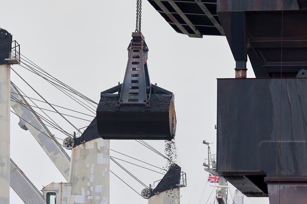 Coking coal is unloaded at Immingham Port, northern England, Tuesday, April 15, 2025. (Darren Staples/Pool Photo via AP)