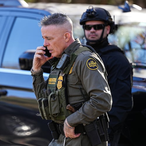 U.S. Border Patrol Commander at large Gregory Bovino takes a phone call, Monday, Nov. 17, 2025, in Charlotte, N.C. (AP Photo/Matt Kelley)