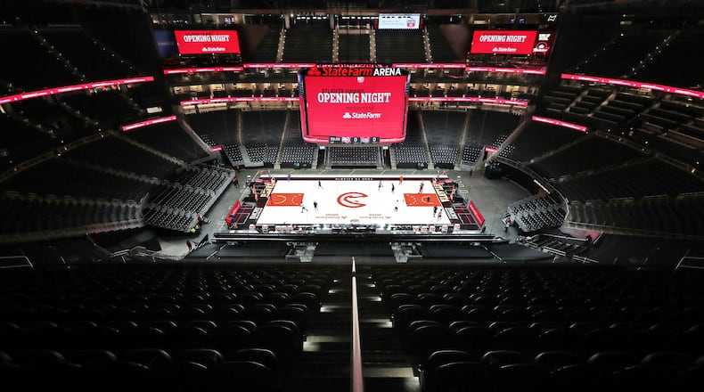 122820 ATLANTA: State Farm Arena is mostly empty as the Atlanta Hawks prepare to play the Detroit Pistons in their home opener NBA basketball game on Monday, Dec. 28, 2020, in Atlanta. “Curtis Compton / Curtis.Compton@ajc.com”
