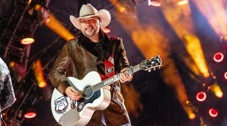 Jason Aldean performs in Nashville in December. On Saturday, he'll perform with Luke Bryan at Sanford Stadium in Athens. (Amy Harris/Invision/AP)