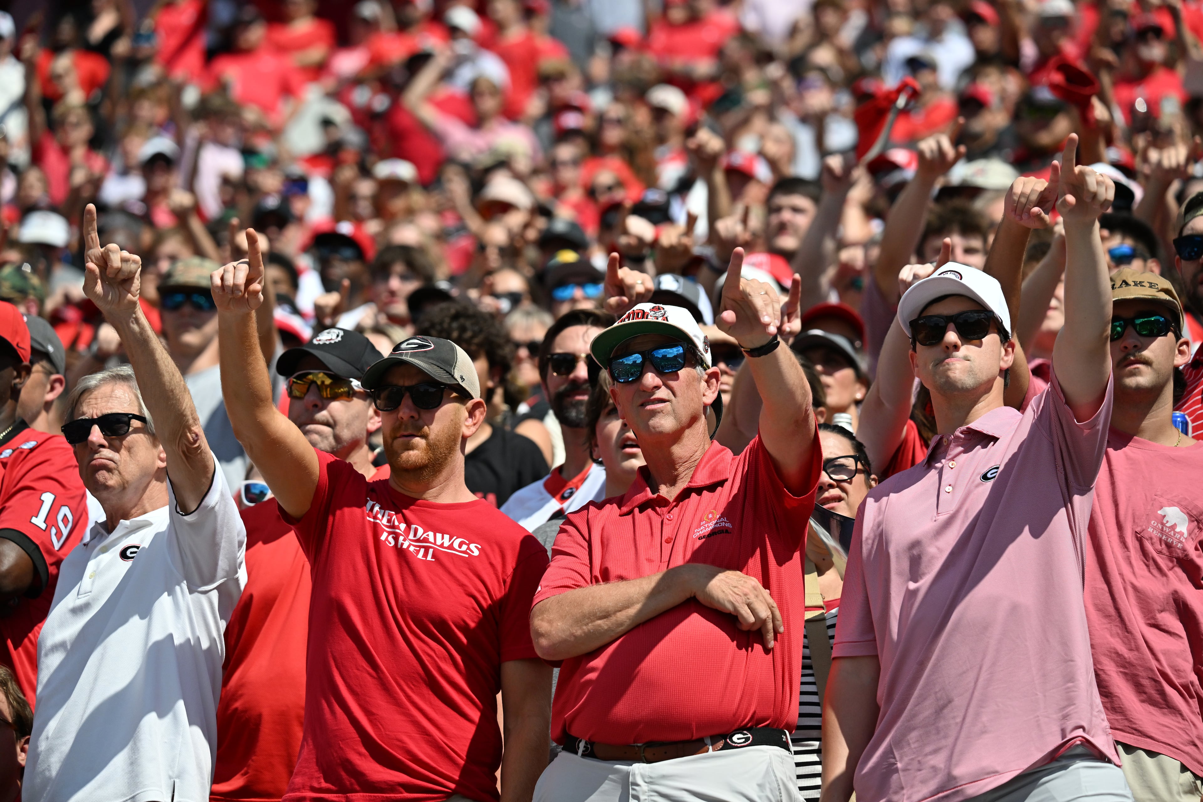 Georgia fans cheer before Georgia football's season opener and home opener against Marshall at Sanford Stadium, Saturday, August 30, 2025, in Athens. (Hyosub Shin / AJC)