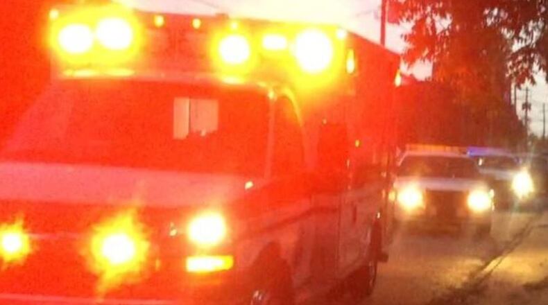 An ambulance and patrol cars responded Tuesday to an apparent suicide attempt in Macon. (Credit: Macon Telegraph)