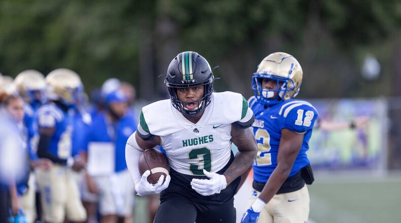 Langston HughesÕs Terrance Love (3) runs the ball during a GHSA High School football game between Langston Hughes High School and McEachern High School at McEachern High School in Powder Springs, GA., on Friday, August 26, 2022. (Photo by Jenn Finch)