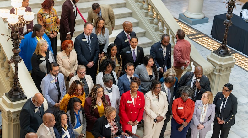 Henry County Chair Carlotta Harrell addresses the media at a joint news conference of local leaders at the Georgia Capitol to voice opposition to House Bill 369. (Ben Hendren for the AJC)