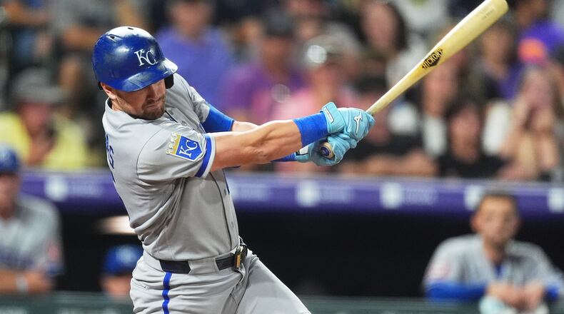 Kansas City Royals' Lane Thomas singles off Colorado Rockies starting pitcher Tomoyuki Sugano in the sixth inning of a baseball game Friday, July 31, 2026, in Denver. (AP Photo/David Zalubowski)