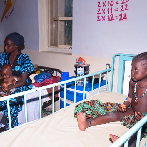 Women and children who were rescued after being held in a forest after they were abducted from the Woro community by gunmen in February receive medical attention at a hospital in Ilorin, Nigeria, Friday, Aug. 7, 2026. (AP Photo/Abubakar Khadijat)