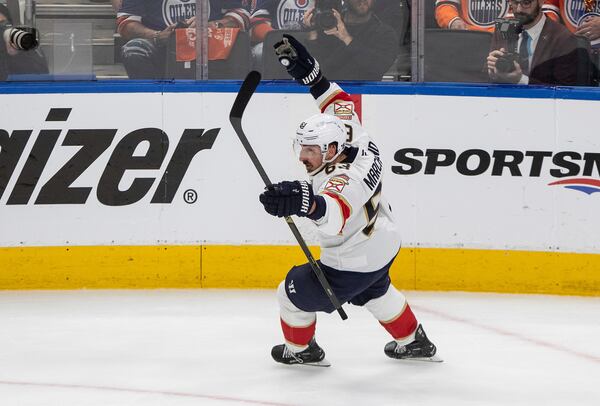 Florida Panthers' Brad Marchand (63) celebrates a goal against the Edmonton Oilers during the second period in Game 2 of the NHL hockey Stanley Cup Finals in Edmonton, Alberta, Friday, June 6, 2025. (Jason Franson/The Canadian Press via AP)