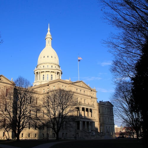 FILE - The state Capitol building is seen on Dec. 12, 2012, in Lansing, Mich. (AP Photo/Carlos Osorio, File)