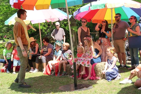 Kids learn about snakes at the Inman Park Festival. 
(Courtesy of the Inman Park Festival / Anya Reid)
