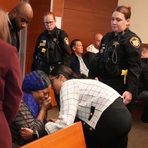Ta'Kiya Young's grandmother, Nadine Young, reacts as the verdict is read in the trial of Blendon Township police officer Connor Grubb, who was found not guilty in the on-duty death of her daughter at Franklin County Common Pleas Court in Columbus, Ohio on Friday, Nov. 21, 2025. (Doral Chenoweth/The Columbus Dispatch via AP, Pool)