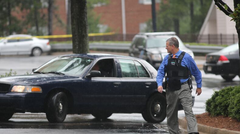 A shooting was reported near the Sheraton hotel on Hammond Drive, according to Capt. Steve Rose with Sandy Springs police. BEN GRAY/BGRAY@AJC.COM