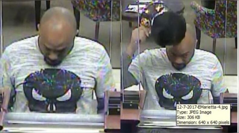 A man wearing a "Punisher" T-shirt robbed a Cobb County and other area banks, the FBI said.