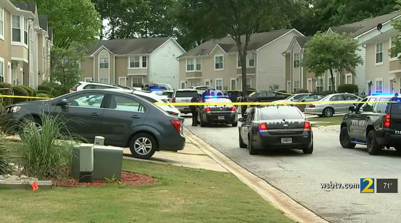 Police gathered outside a home in the 5000 block of Chupp Way Circle after a woman was shot while she was inside her residence May 23.